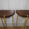 Demi lune occasional tables in black walnut and white ash 18" diameter by 30" tall
